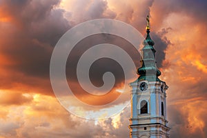 Dormition church tower in Novi Sad, Serbia. Beautiful orthodox religious building in summer sunset