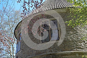 Dortmund, Ruhr Area, North Rhine Westphalia ,Germany - April 16 2018: Gatehouse of the castle BrÃÂ¼nninghausen at the park entrance