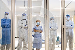 Dortor, Nurse and patient looking out in the quarantine room - 19 Concept