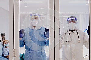 3 of Dortor, Nurse and patient looking out in the quarantine room - 19 Concept photo
