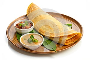 Dosa on autentic plate isolated on white background