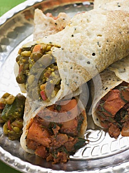 Dosa Stuffed with Aloo Masala and Sambhar photo