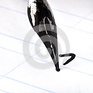 Dot the I by tip of nib of ink drawing pen