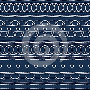 Doted circles geometric seamless pattern in blue and white, vector
