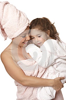 Doting mother and daughter bathtime