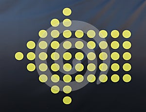 Dots arrow icon sign on different background.