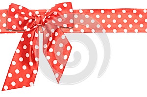 Dotted red satin gift bow and ribbon