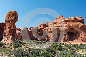 Double Arch is a close-set pair of natural arches in Arches National Park in southern Grand County, Utah, United States, that is o