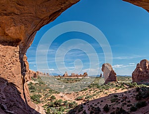 Double Arch is a close-set pair of natural arches in Arches National Park in southern Grand County, Utah, United States, that is o