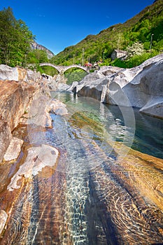 Double arch stone bridge at Ponte dei Salti with waterfall, Lavertezzo, Verzascatal, Ticino photo