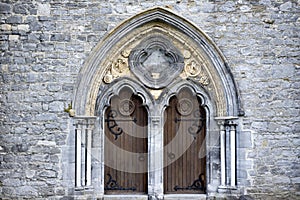 Double arched wooden doors