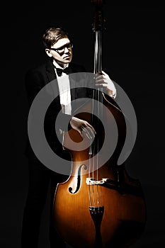 Double bass player. Classical musicians playing contrabass