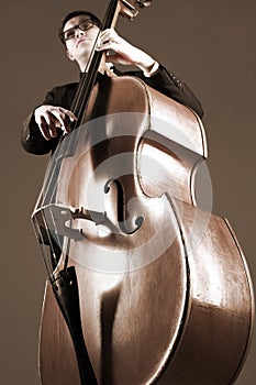 Double bass player with contrabass