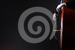 Double bass player playing contrabass