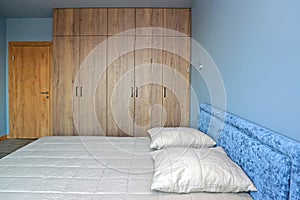 Double bed and wardrobe in a modern bedroom photo