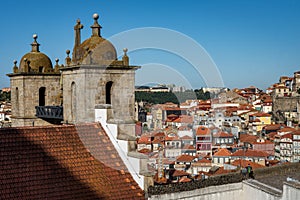 The double bell towers of the Sao Lourenco church in Porto, Portugal photo