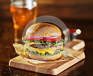 Double cheese burger with beer