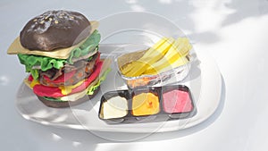 Double cheese burger dark chocolate set are french fries of sculpture molding clay