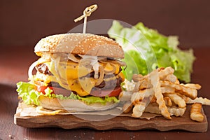 Double cheeseburger with tomato and onion