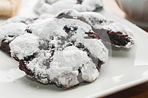 Double chocolate crinkle cookies on white plate