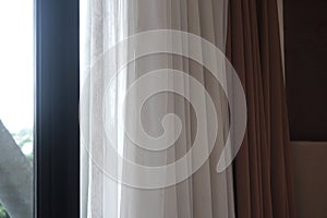 Double curtains installed in hotel rooms.