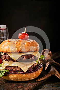 Double decker cheesy venison burger photo
