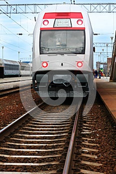 Double-decker train in station