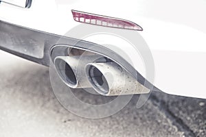 Double exhaust pipes of a modern sports car,