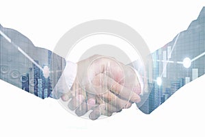 Double exposure of business partner handshake and Display stock market investment trading , Business analyzing financial