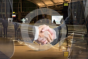 Double exposure Business people shaking hands