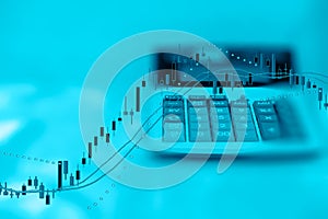 Double Exposure of Business Report calculator and investment graph with copy space