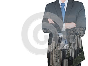 Double exposure of businessman and city