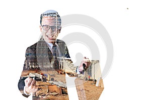 Double exposure of Businessman and construct site