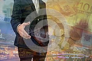 Double exposure of businessman giving his hand for handshake with cityscape and EURO money