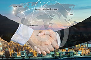 Double Exposure of a businessman handshake with Map global part