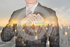 Double exposure of Businessman put Euro money in his suit pocket and 4G 5G node networking cellsite and cityscape at sunset as