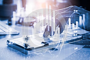 Double exposure businessman and stock market or forex graph suitable for financial investment concept. Economy trends background