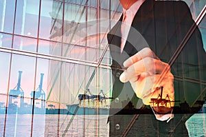 Double Exposure of Businessman writing and Port Cargo and Airplane