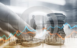 Double exposure of city and rows of coins with stock and financial graph on virtual screen. Business Investment concept.