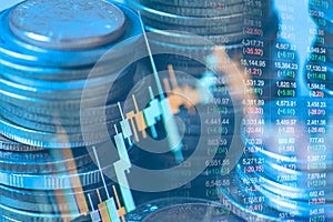 Double exposure of coin and graph of financial for investment strategy