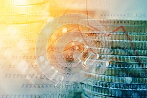 Double exposure of coins and book bank with graph for business and finance background