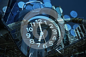 Double exposure of coins stack with alarm clock background and f