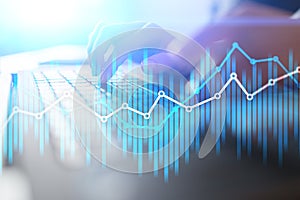 Double exposure economic charts and graphs on virtual screen. Online trading, Business and finance concept. photo