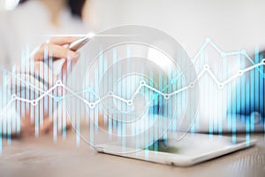 Double exposure economic charts and graphs on virtual screen. Online trading, Business and finance concept.