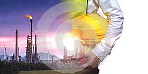 Double exposure of engineer holding walkie talkie are working orders the oil and gas refinery plant.