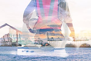 Double Exposure of Engineer in Safety Equipment on Shipping Terminal Industry Background, Technician Man Operator of Handling