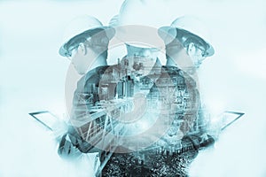 Double exposure of Engineer or Technician man with safety helmet