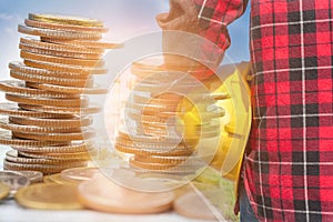 Double exposure of engineer and workers security with money coin stack on oil refiner background, business concept photo