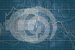 Double exposure euro symbol and financial market chart.
