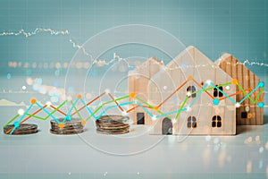 Double exposure of Financial stock market graph and rows of coins growth